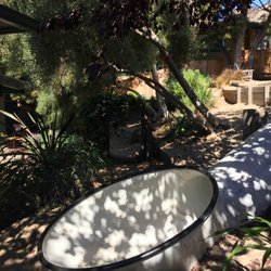 Children's Community Center - Front yard hillside pipe slide.