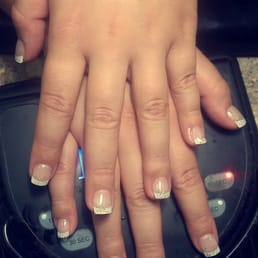 Love My Nails they did them just the way I wanted them short and thin and glittery! They came out amazing!
