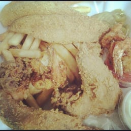 Whole wings, catfish, and fried shrimp w bread, coleslaw, pickles, peppers, and fries! Whole wings, catfish, and fried shrimp w bread, coleslaw, pickles, peppers, and fries!
