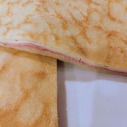 Quelque Chose Macaron Boutique - Ham and Swiss crepe. A bit thin, but very tasty. Good quality ham, real shredded Swiss cheese (not processed cheese slice). Soft crepe.