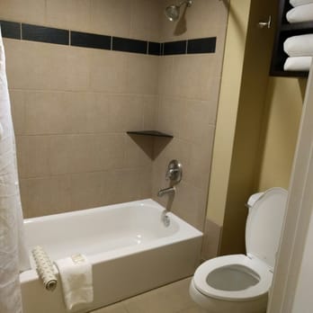 Peacock Suites - Bathroom. Poor water pressure in shower, very loud flush sound from toilet. - Hotels Near Me - Anaheim, California
