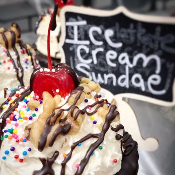 Stackd Brownies - a close up of a chocolate sundae with sprinkles and a cherry - Desserts Near Me - Lake Mary, Florida Stackd Brownies - a close up of a chocolate sundae with sprinkles and a cherry - Desserts Near Me - Lake Mary, Florida