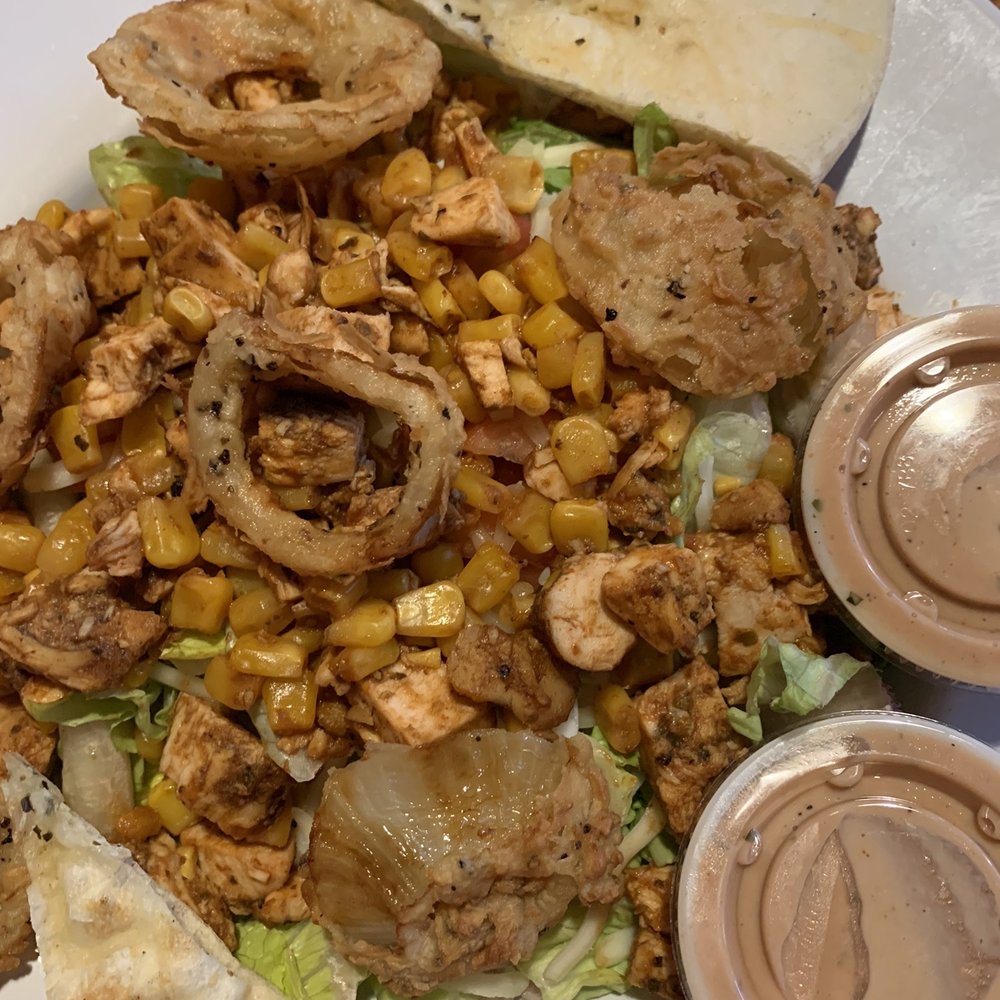 a plate of food on a table a plate of food on a table