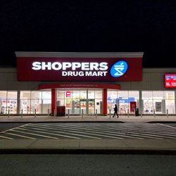 Shoppers Drug Mart - Storefront at night