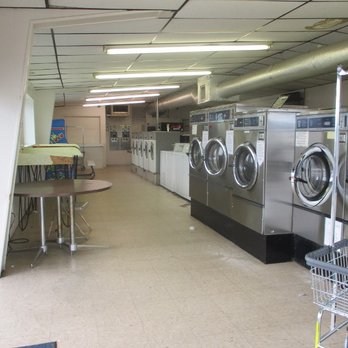 Norge Village Coin Laundry - Lots of different size washers with signs. - Laundromat Near Me - Lawrence, Kansas Norge Village Coin Laundry - Lots of different size washers with signs. - Laundromat Near Me - Lawrence, Kansas