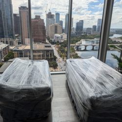 MASH Movers - Wrapped some couches up on the 25th floor. Sweet view of downtown and Lady Bird lake!