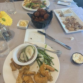 Cockeyed Clam - Calamari and hush puppies (best honey butter I've tasted) shrimp with green beans and cucumber salad grouper sandwich with fries. - American Near Me - Buxton, North Carolina Cockeyed Clam - Calamari and hush puppies (best honey butter I've tasted) shrimp with green beans and cucumber salad grouper sandwich with fries. - American Near Me - Buxton, North Carolina