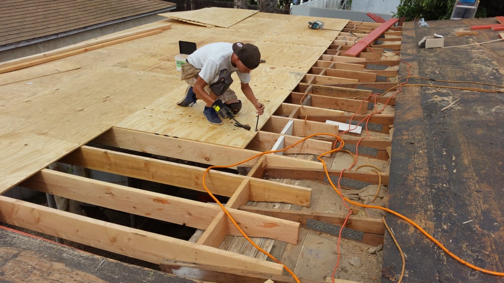 Slide of Kenney Roofing