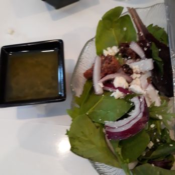 Le Crepe - Half of baby greens house salad, the half already in take home box. Candied pecans and dried cherries add to the enjoyment. - Creperies Near Me - Royal Oak, Michigan