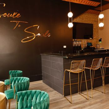 Soule To Soule - a bar with green chairs - Soul Food Near Me - Chicago, Illinois