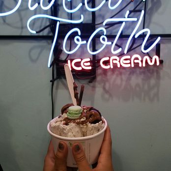 Sweet Tooth Rolled Ice Cream - Icecream and sign - Desserts Near Me - Calgary, Alberta Sweet Tooth Rolled Ice Cream - Icecream and sign - Desserts Near Me - Calgary, Alberta