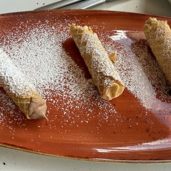 Trattoria Di Napoli - Chocolate cannoli, butterscotch, cannoli, and vanilla cream cannoli - Italian Near Me - Perry, Georgia Trattoria Di Napoli - Chocolate cannoli, butterscotch, cannoli, and vanilla cream cannoli - Italian Near Me - Perry, Georgia