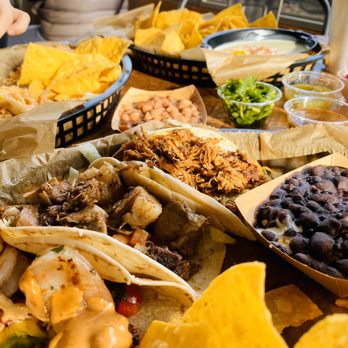 NuvoTaco - Left to right: grilled shrimp, garlic beef, and pork butt. - Mexican Near Me - Durham, North Carolina NuvoTaco - Left to right: grilled shrimp, garlic beef, and pork butt. - Mexican Near Me - Durham, North Carolina