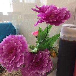 Fresh flowers lol. Love the kitsch. Fresh flowers lol. Love the kitsch.