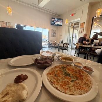 Spice Junction - Uttappam, goat vindaloo and naan - Indian Near Me - Baton Rouge, Louisiana