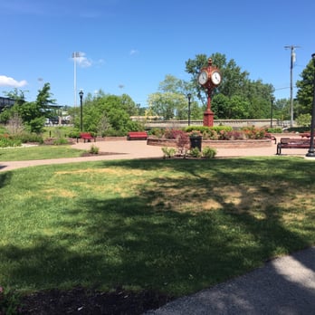 Clinton River Heritage Park - A small sitting area in Utica on Auburn Road along the trail with Jimmy John's field in the distance. - Active Life Near Me - Utica, Michigan
