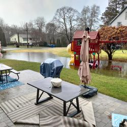 Pepas Landscaping - Flooding as a result of improper yard grading by Dave Pepas.