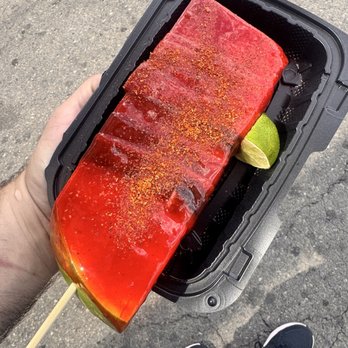 California State Fair - Sandia Pop Watermelon wrapped in fruit rollups dipped in chamoy and sprinkled with tajin served with a lime 6/5 - Festivals Near Me - Sacramento, California California State Fair - Sandia Pop Watermelon wrapped in fruit rollups dipped in chamoy and sprinkled with tajin served with a lime 6/5 - Festivals Near Me - Sacramento, California