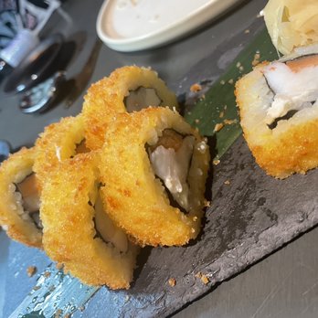 Amazonia Nikkei - Sushi rolls (we already started to eat from it) but delicious!!! - Japanese Near Me - Miami Lakes, Florida