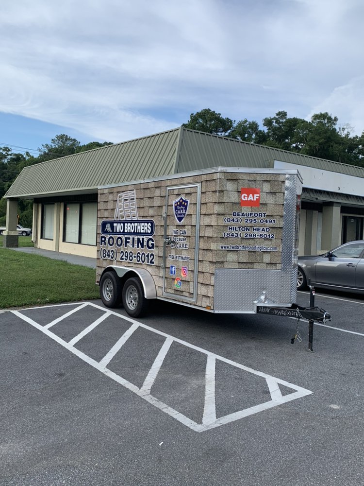 Slide of Two Brothers Roofing