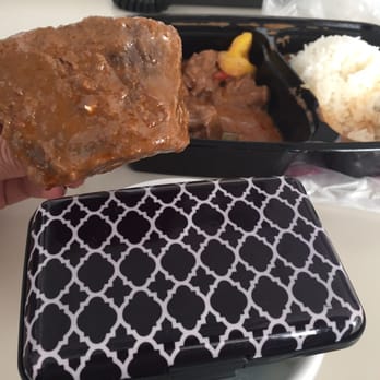 Kinnara Thai - The "diced" beef curry. See how big it is! Most as big as a credit card! (That's my wallet) - Thai Near Me - Van Nuys, California Kinnara Thai - The "diced" beef curry. See how big it is! Most as big as a credit card! (That's my wallet) - Thai Near Me - Van Nuys, California