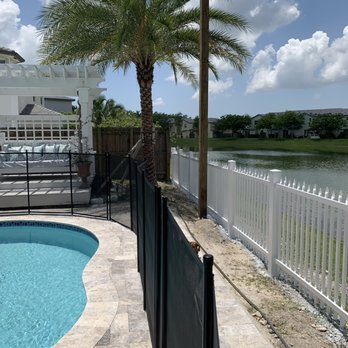 Fence Solutions - Another angle of Aluminum fence with one of the 6x6x14 post free standing - Fences & Gates Near Me - Homestead, Florida
