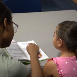Finkelstein Memorial Library - Practicing literacy through decoding & phonics during our Reading Buddies summer program.