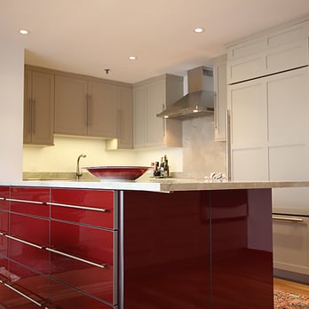Mfive Chicago - a kitchen with red cabinets - General Contractors Near Me - Chicago, Illinois Mfive Chicago - a kitchen with red cabinets - General Contractors Near Me - Chicago, Illinois