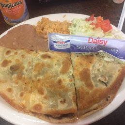This is the beef quesadilla plate, with beans, rice and a salad. This is the beef quesadilla plate, with beans, rice and a salad.