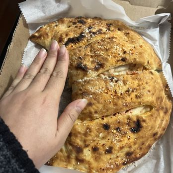 Gaia Masala & Burger - size of the Chicken Tikka Masala Calzone - Indian Near Me - Astoria, New York Gaia Masala & Burger - size of the Chicken Tikka Masala Calzone - Indian Near Me - Astoria, New York