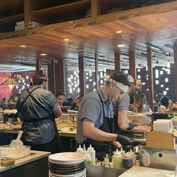 Precision and focus at the sushi bar. Precision and focus at the sushi bar.