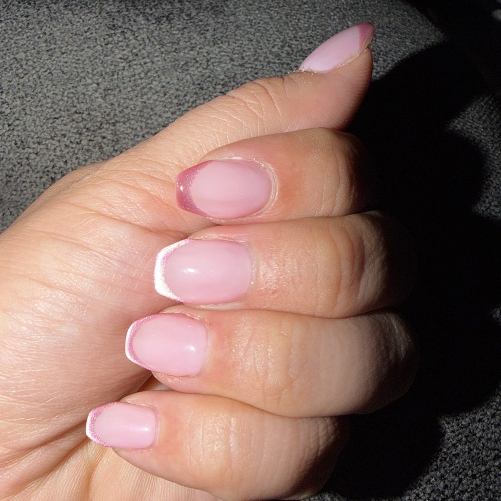 French tip with cat eye tip. French tip with cat eye tip.
