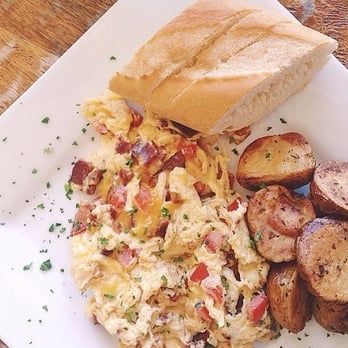 Starling Diner - Scrambled eggs with Roma tomatoes, applewood bacon, and cheddar - New American Near Me - Long Beach, California Starling Diner - Scrambled eggs with Roma tomatoes, applewood bacon, and cheddar - New American Near Me - Long Beach, California