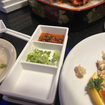 Sushishima - Castle Hills - Check out the Thai chili sauce in the back - Japanese Near Me - Castle Hills, Texas Sushishima - Castle Hills - Check out the Thai chili sauce in the back - Japanese Near Me - Castle Hills, Texas