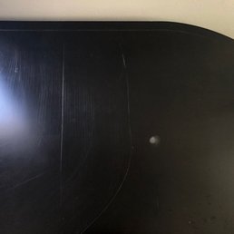 Scratch across dining table