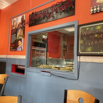 Mia Pizzeria - Window with breadsticks - Pizza Near Me - Indianapolis, Indiana Mia Pizzeria - Window with breadsticks - Pizza Near Me - Indianapolis, Indiana