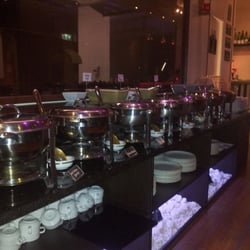 Town Grill - A round of Buffet meal along with Fresh Salads and Hot Naans (Flatbreads) served to your satisfaction. Desserts to follow.