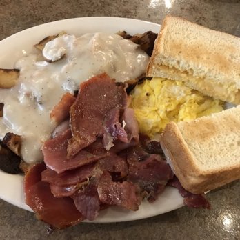 Dempseys Grille - Country ham with eggs and sausage gravy on the home fries. - Diners Near Me - Middletown, Maryland Dempseys Grille - Country ham with eggs and sausage gravy on the home fries. - Diners Near Me - Middletown, Maryland
