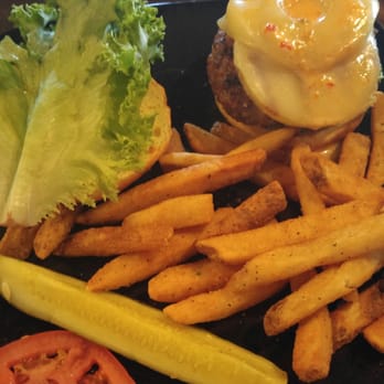 Riptides Raw Bar & Grill - Hamburger with pineapple - Seafood Near Me - Ormond Beach, Florida Riptides Raw Bar & Grill - Hamburger with pineapple - Seafood Near Me - Ormond Beach, Florida
