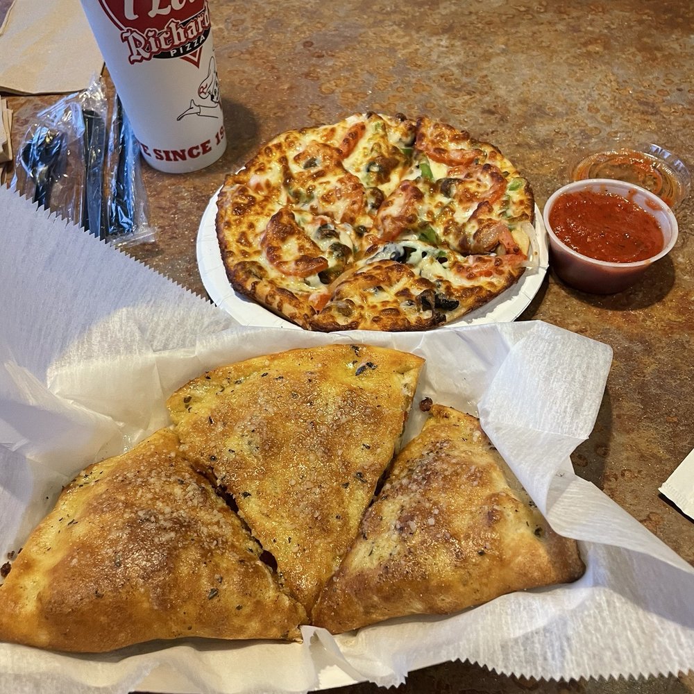 Richards Pizza - Calzone with dipping sauce. Farmers pizza. - Pizza Near Me - Monroe, Ohio Richards Pizza - Calzone with dipping sauce. Farmers pizza. - Pizza Near Me - Monroe, Ohio