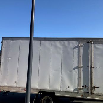 Colonial Van Lines - Moving van with items strapped to the liftgate - Movers Near Me - Pompano Beach, Florida