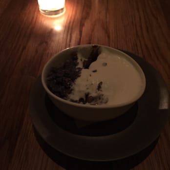 Perry St - Chocolate Pudding Cake; Lightly whipped cream; Crystalized violets - New American Near Me - New York, New York