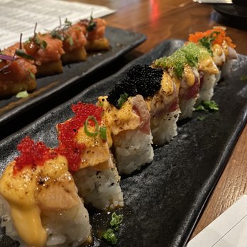Fúdo - "A Star is born" w/ spicy tuna, crab salad, crunch topped w/ seared tuna, yellowtail, salmon, spicy aioli, spicy ponzu, scallions, & tobiko. - Asian Fusion Near Me - Chamblee, Georgia Fúdo - "A Star is born" w/ spicy tuna, crab salad, crunch topped w/ seared tuna, yellowtail, salmon, spicy aioli, spicy ponzu, scallions, & tobiko. - Asian Fusion Near Me - Chamblee, Georgia
