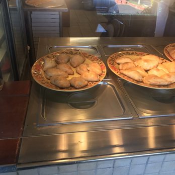 Bruno's Pizza - two pies on a counter - Pizza Near Me - Bay Shore, New York