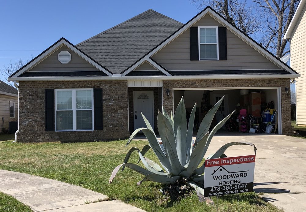 Slide of Woodward Roofing