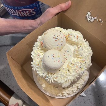 The Naked Lemon - Chocolate cake with vanilla frosting, topped with macaroons - Bakeries Near Me - Astoria, Oregon