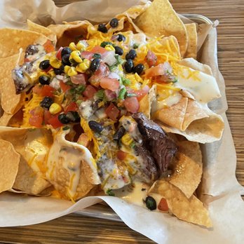 5280 Burger Bar - My steak nachos..they were amazing.  Had a little kick to it - Burgers Near Me - Denver, Colorado
