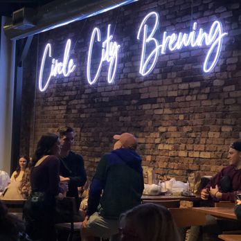 Circle City Brewing - a group of people sitting at tables - Brewpubs Near Me - Dothan, Alabama
