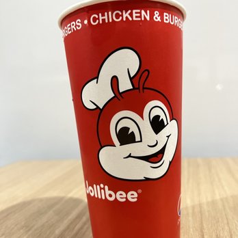 Jollibee - a red cup with a cartoon character on it - Chicken Shop Near Me - Alexandria, Virginia