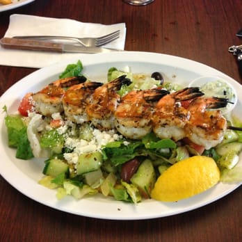 Mikonos Grill - The shrimp salad. It looks exactly like the hanging picture. - Greek Near Me - Milpitas, California